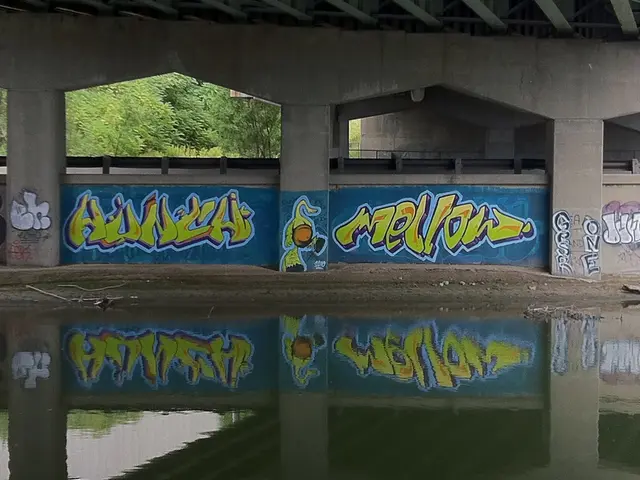 In the image we can see this is an arc building, water, sand and trees. This is a painting.