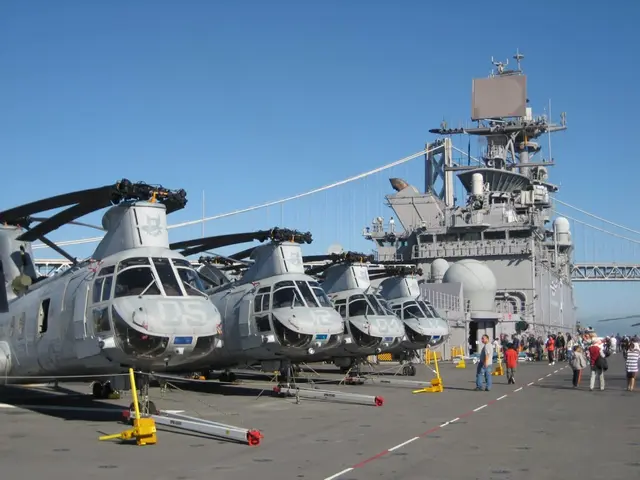 In this image we can see some planes. we can also see some people standing on the road. On the...