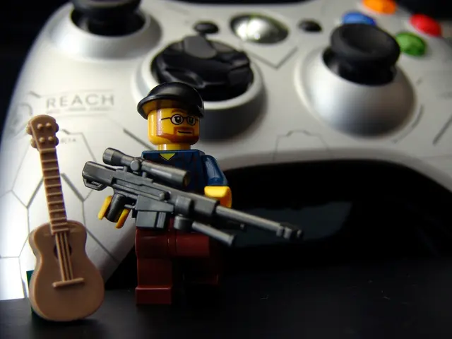 In the image there is a toy with gun and cap. Beside the toy there is a toy guitar. In the...